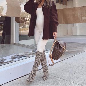 Cream jumpsuit. Slightly see through